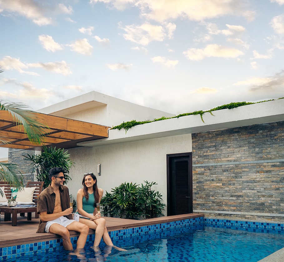 Embassy Grove private pool surrounded by deck and greenery – ideal for luxury living.